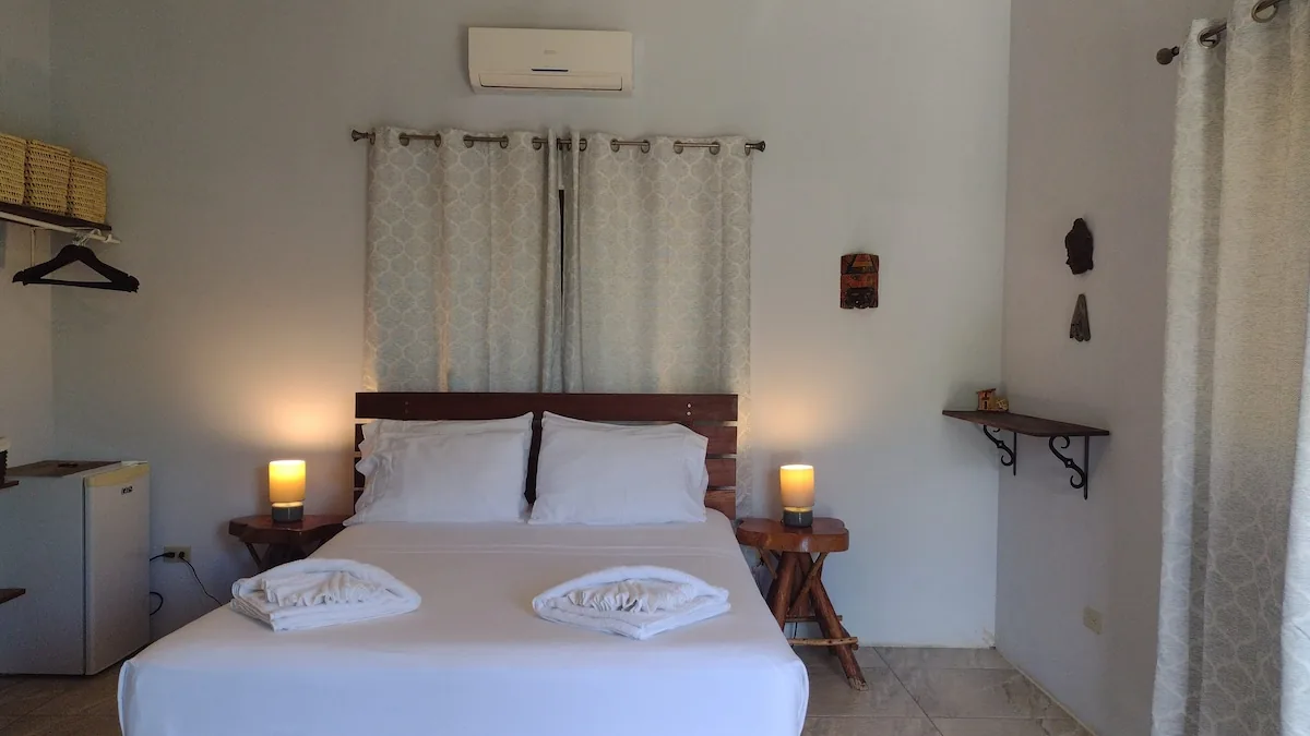 South Casita with queen bed and garden patio at Casa Todo Bueno
